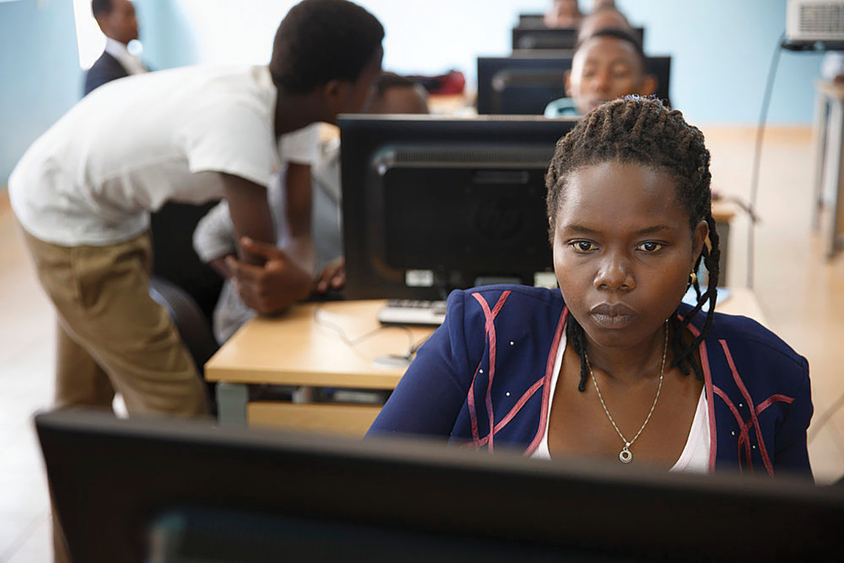 Rwandan student at computer